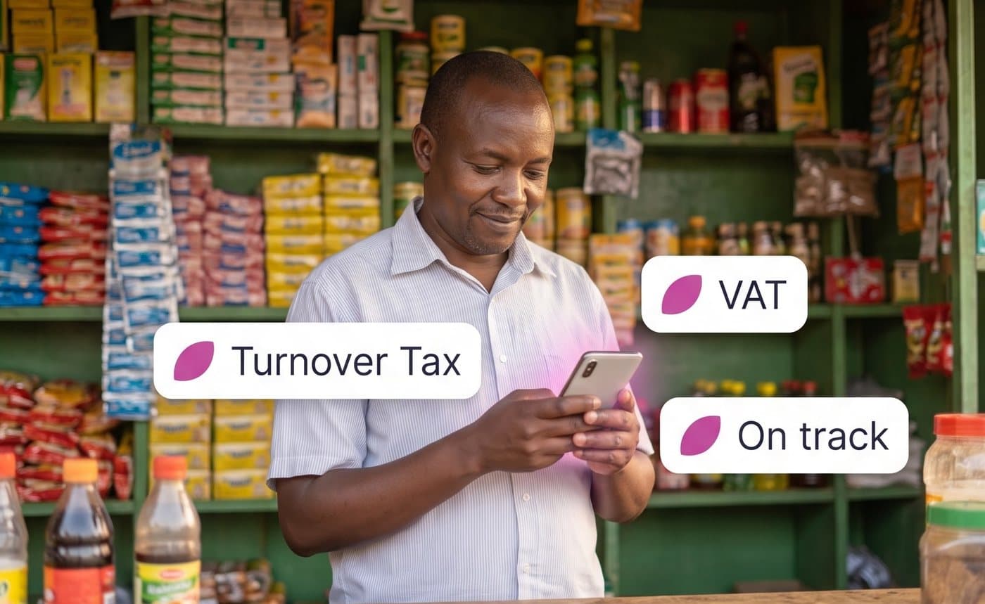 A shopkeeper checking his phone, with tags showing Turnover Tax, VAT and On track
